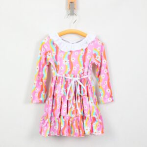 Pink Rainbow Daisy All Over Print Girls Long Sleeve Tiered Ruffle Dress White Ruffle Peter Pan Collar Criss Cross Back Self Tie Waist Layered Swing Twirl Skirt Custom Print Toddler Spring Casual Party Dress